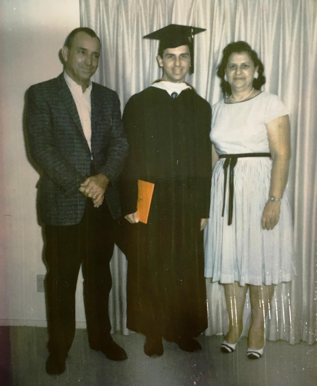 High school graduation, with his Mom and Dad, 1958