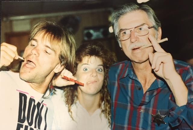Silliness at the going out of business sale at his parents' B&W pet shop in Port Arthur, 1991.