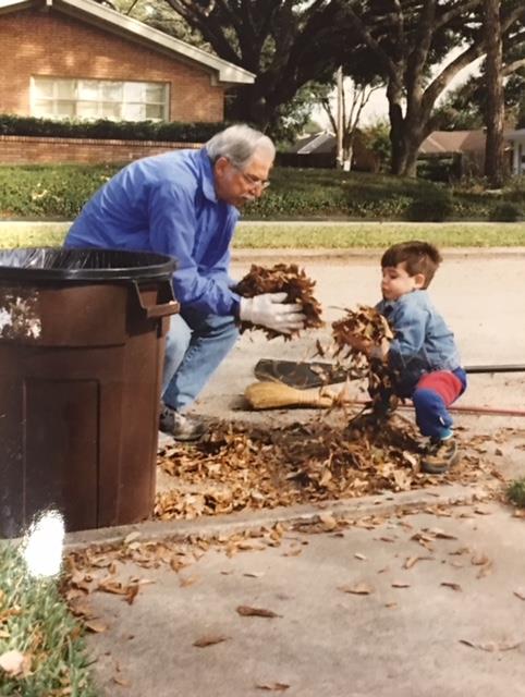 Teaching the next generation how to scoop leaves with your hands. Nathan, 1997