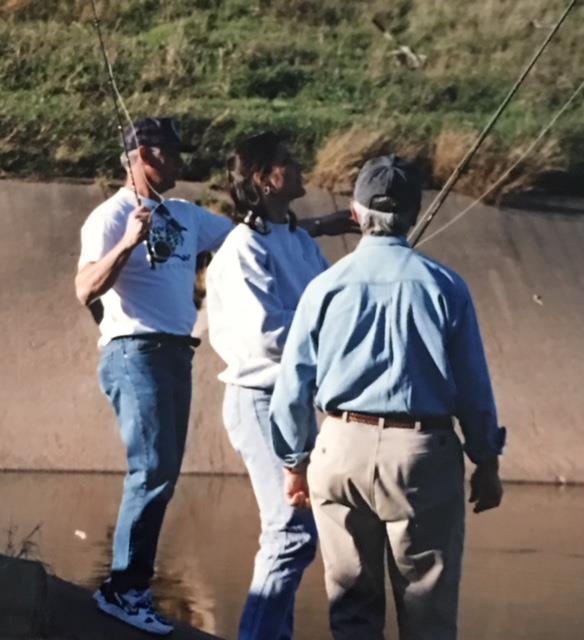 Justin Fox and Sue Hillard, fly fishing lesson on Brays Bayou, February 1998
