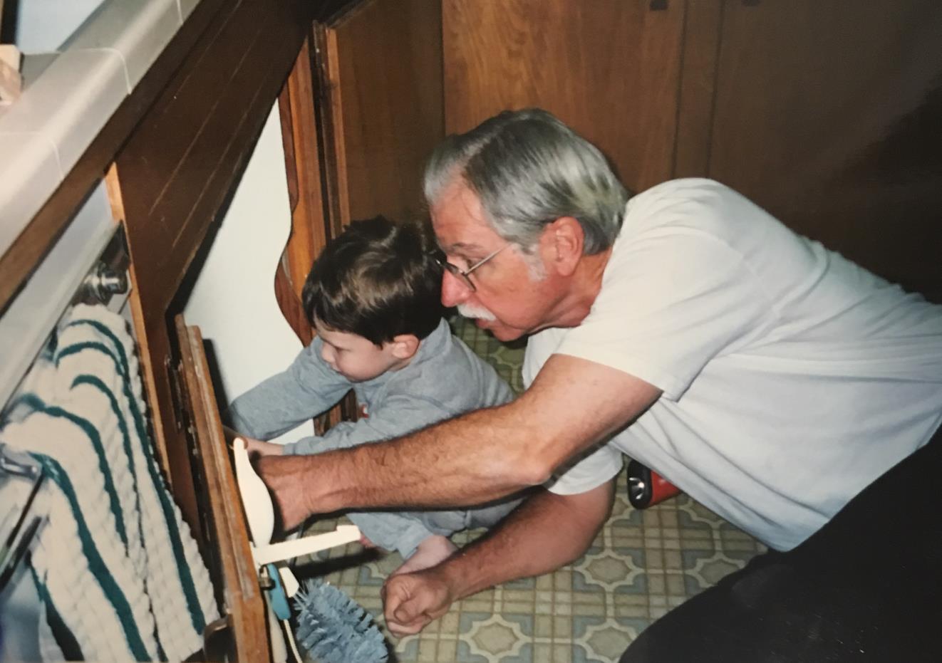 Another plumbing project, another grandson. Here with Mason Wright, August 2001