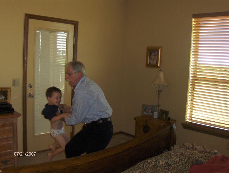 Gene LOVED to throw grandkids on the bed! "Again!", they'd squeal!