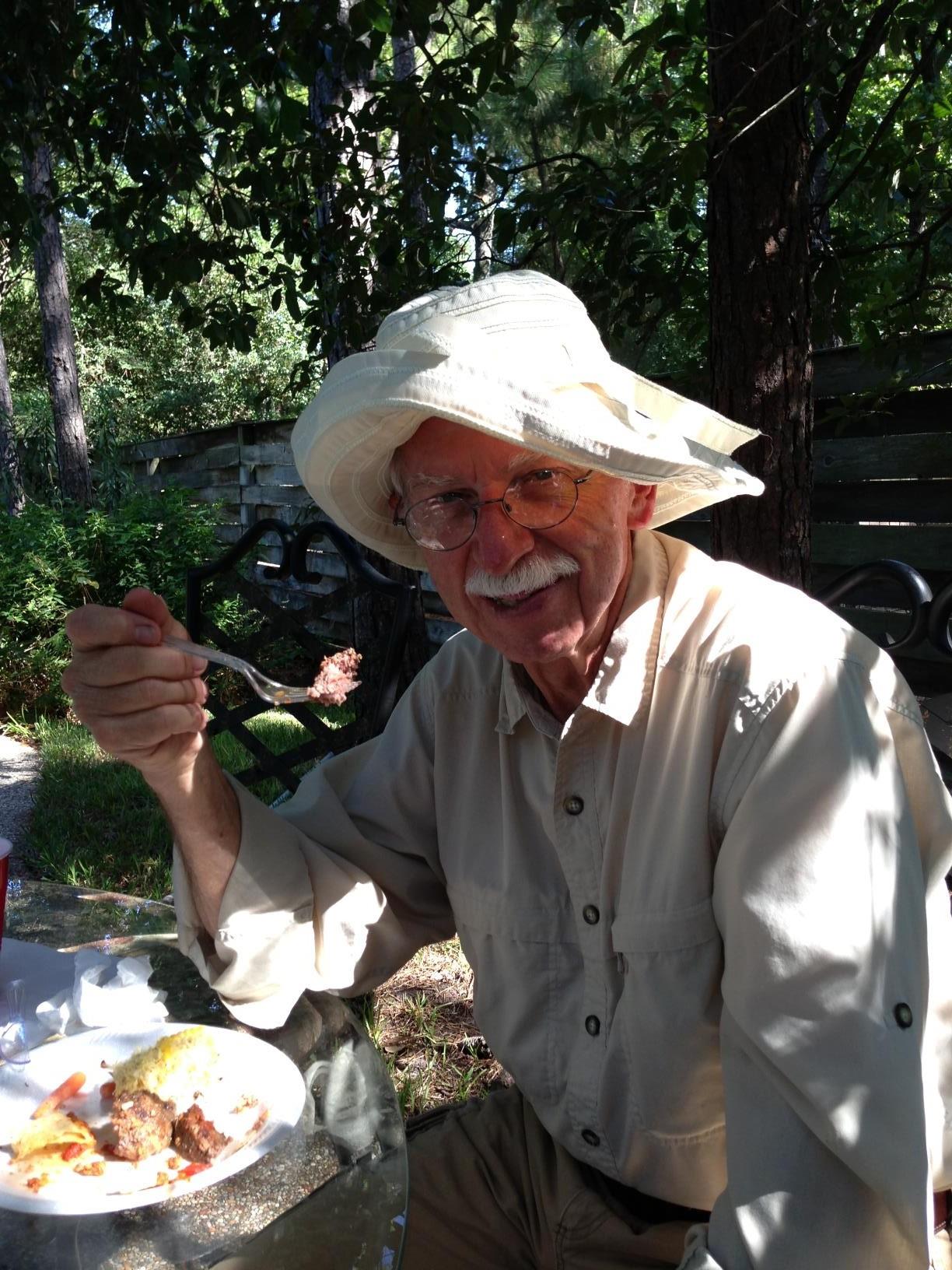 Silly fellow, wearing Marty's hat, summer 2014 at Justin and Scharlene Fox's house.