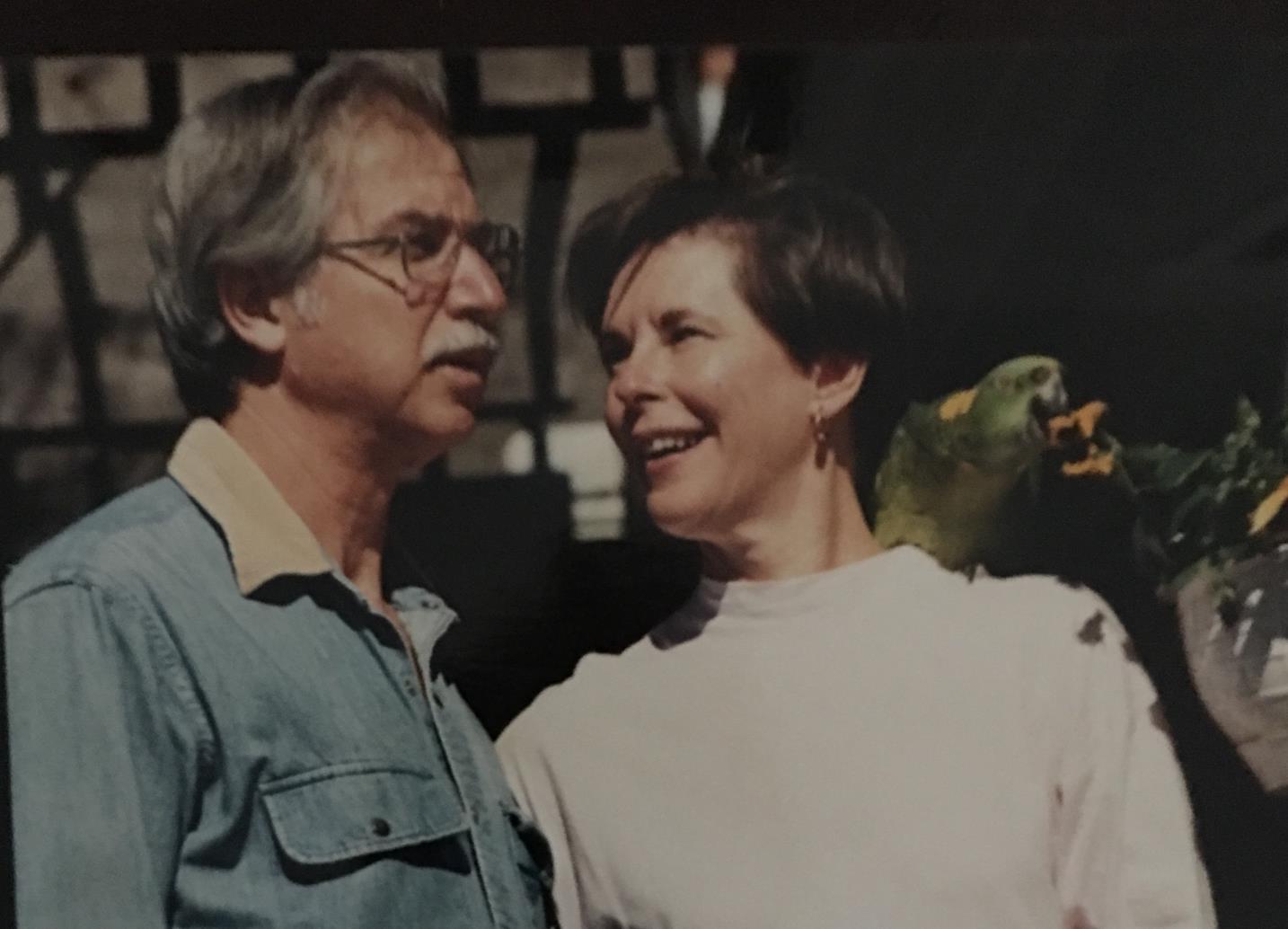 Marty and Gene with Jennifer's parrot, Pepper, on the patio 1990.