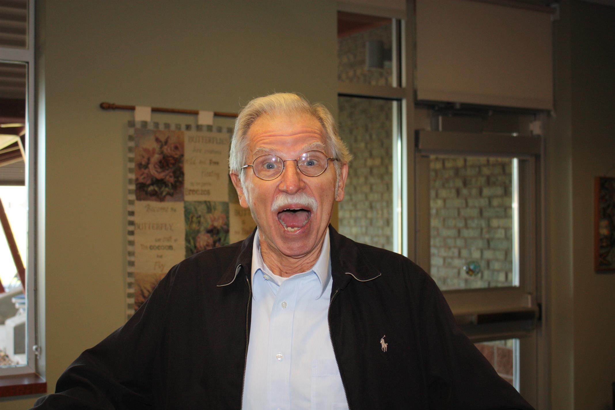 Gene feigning surprise upon entering the new Monarch School on Rosefield for the first time.