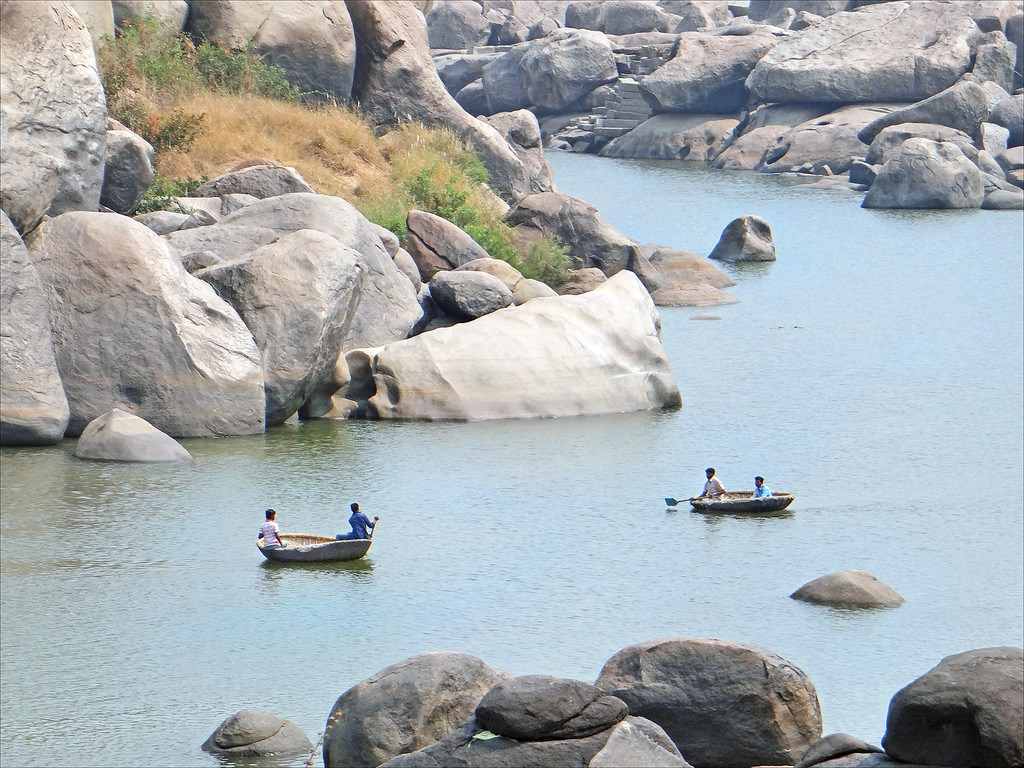 The cute coracles in a rather placid Tungabhadra. Picture Courtesy: Vinoth Chandar