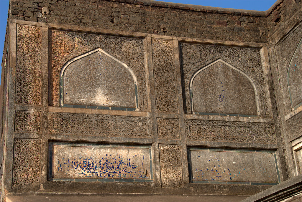 Wet Stucco designs that were once covered by blue tiles