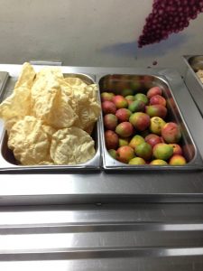 Delicious mangoes waiting to be eaten by us
