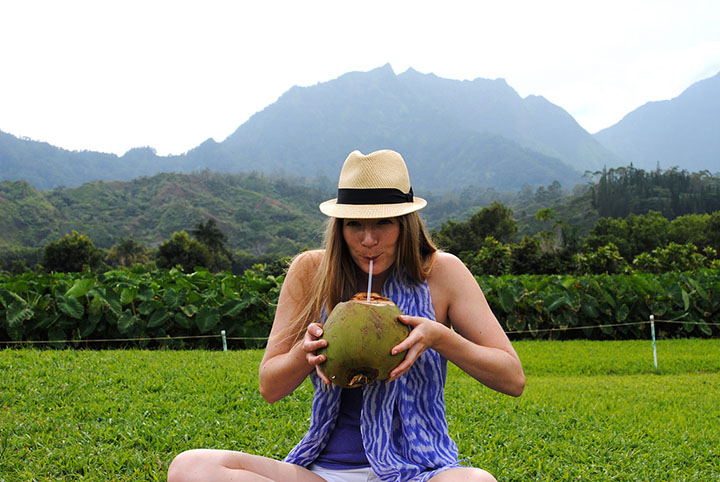 Sipping a coconut in Hanalei, Kauai. Photo courtesy of Keira Morgan via flickr.