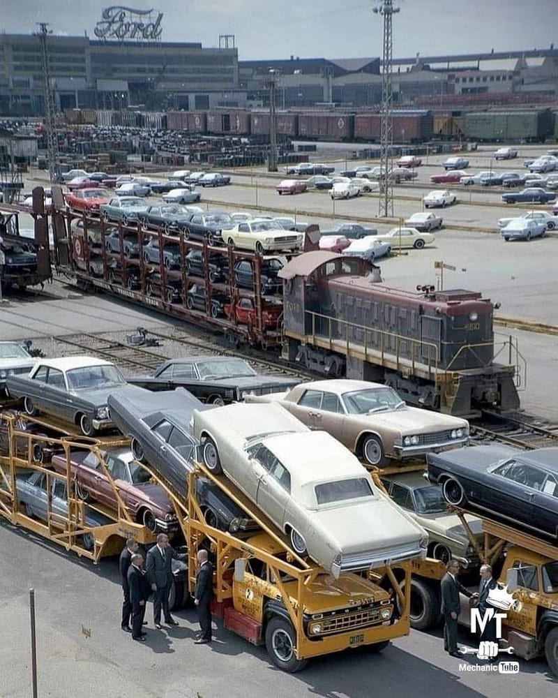 Mustangs loaded onto train car carriers - photo - HomemadeTools.net