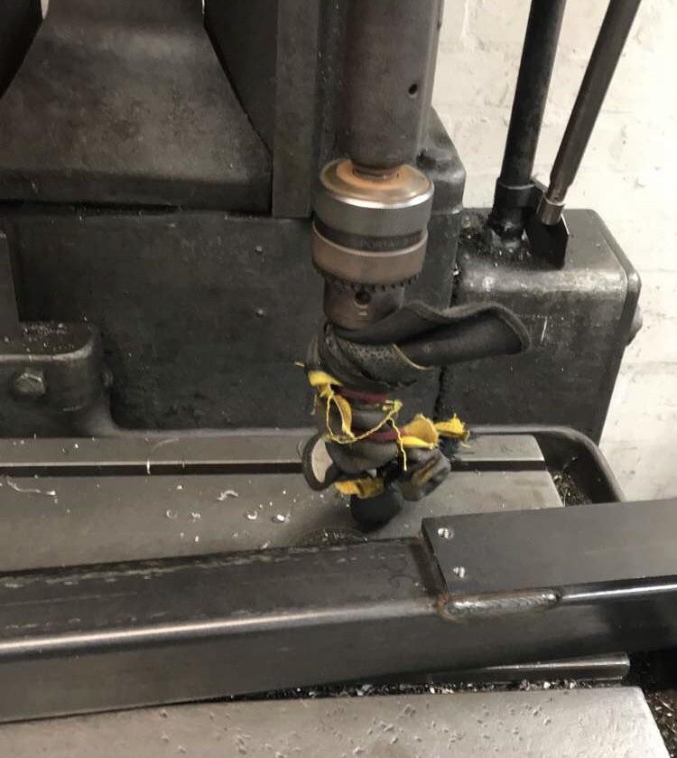 Glove caught in drill press photo