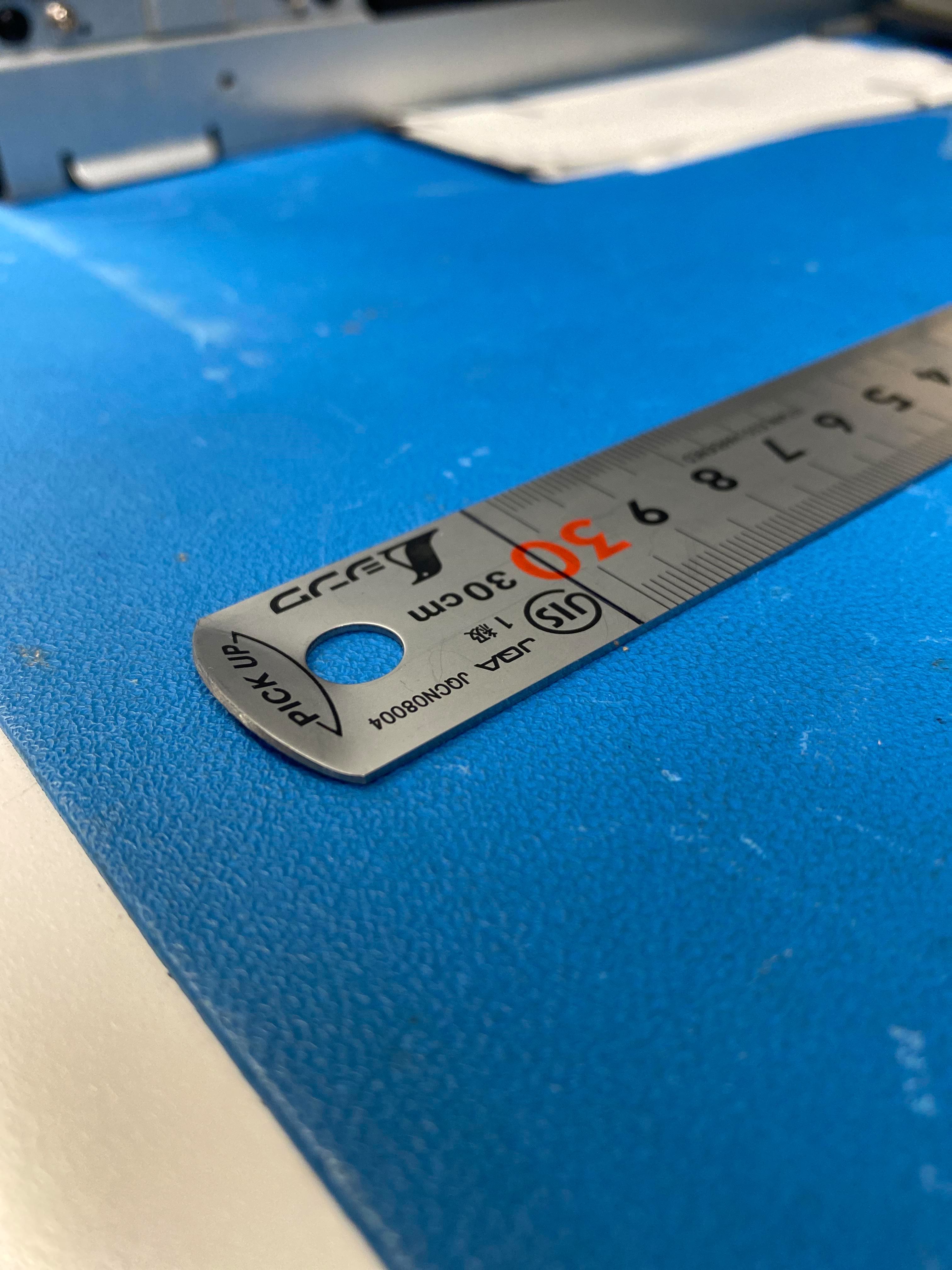 Ruler with raised end for easy pickup - photo