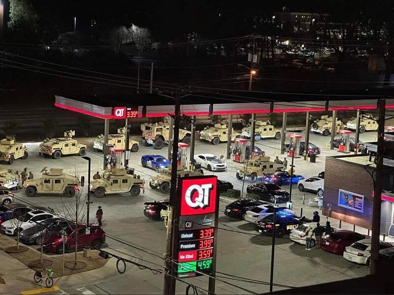 Military convoy at a gas station photo