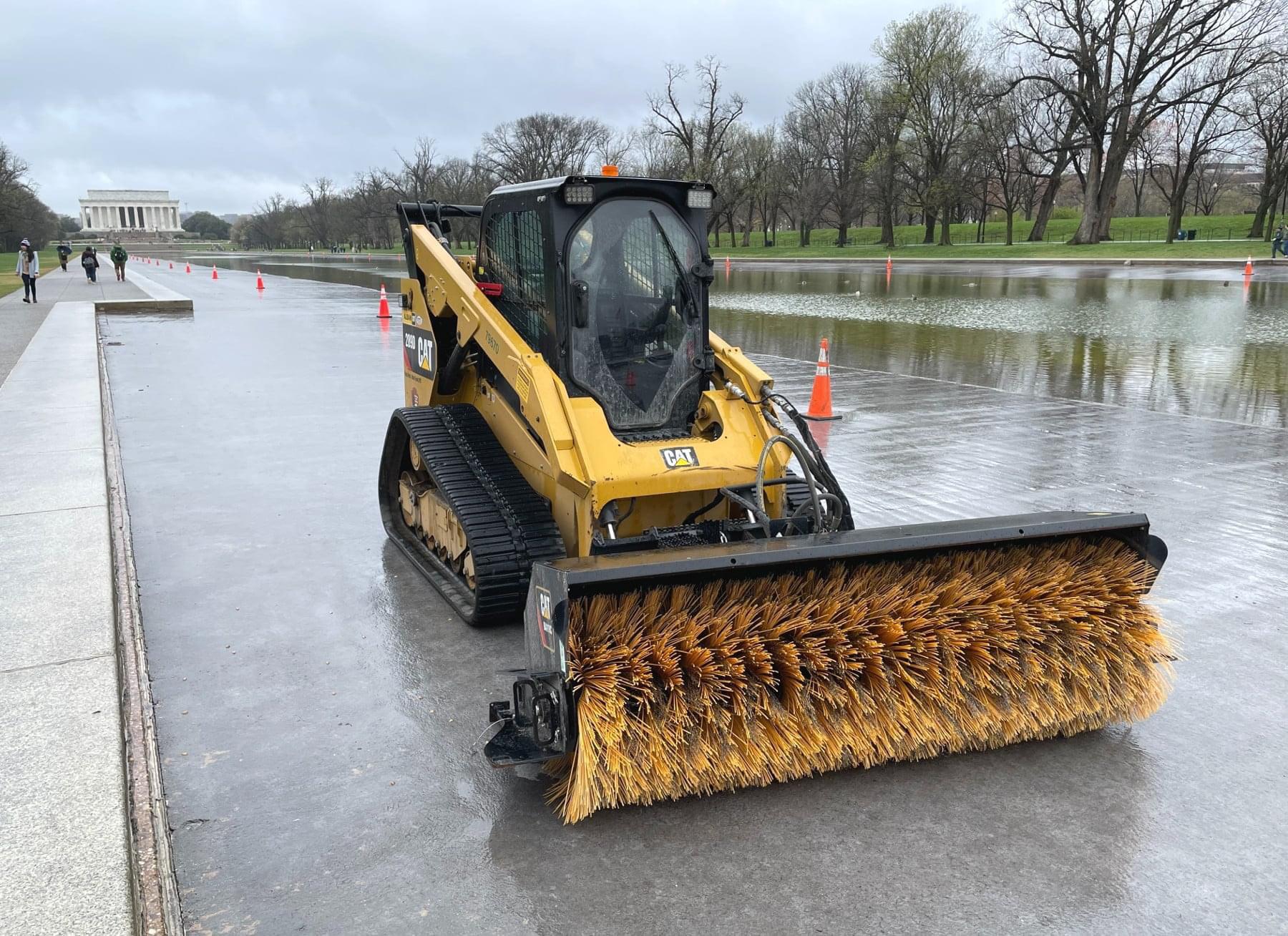 Skid steer sweeper photo