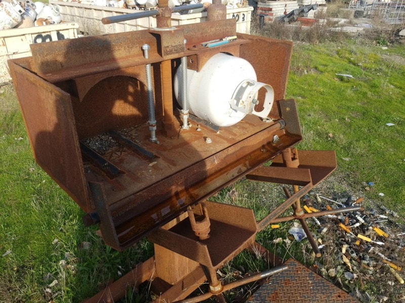 Propane tank valve removal holding fixture photo