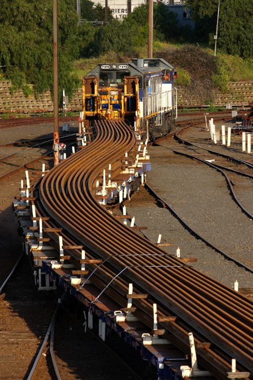 Transporting railroad rail - photo
