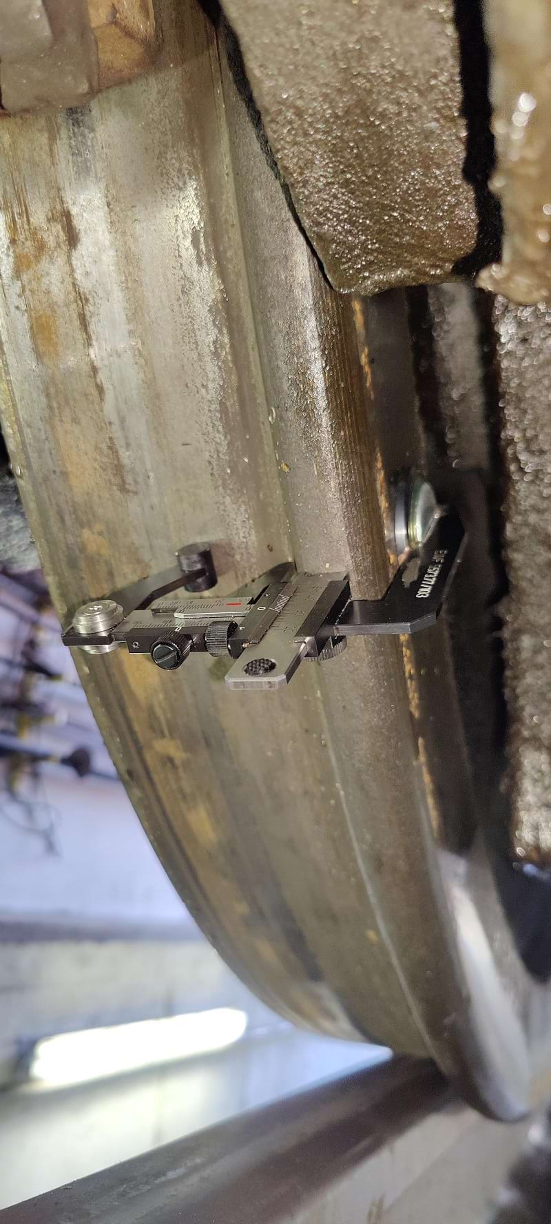 Train wheel flange height and thickness caliper photo