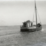 The Owl taking weekend visitors to Bolinas back to San Francisco. The breakers to the left of the Owl indicate the approximate location of the bar. <span>© John Page </span>