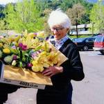 Nancy Kent Danielson delivering Easter flowers to the Greenbrae Care Center from the Marin Garden Club, 2007 <span>© Anne T. Kent Room </span>