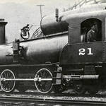 Locomotive 21, first cab-in-front locomotive making its trial run from Sausalito, 1901. Master mechanic Bill Thomas is at the throttle. Source: Narrow Gauge to the Redwoods, p94 <span>© Ada Brown Collection </span>