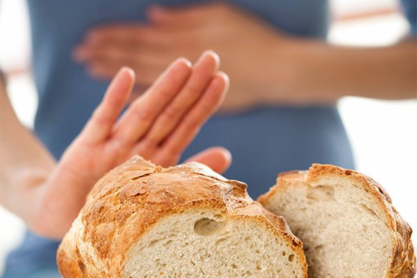 Photo of woman rejecting bread