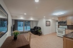 Ground Level Kitchen with Sliders to Patio