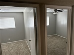 16 View of both bedrooms from hallway