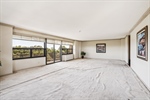 Large Living Space with parquet wood under carpet