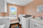 Laundry accessed from master closet or hallway