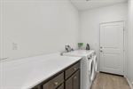 Separate Laundry Room in Hallway