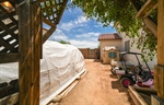 Side yard with enough room for toys