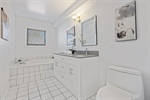 19. Large Soaker Tub Quartz Counters Undermount Sinks