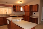 Kitchen view 3 - loads of cabinets
