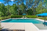 Mature trees provide privacy for the amazing pool