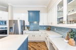 Textured tile backsplash is the perfect backdrop