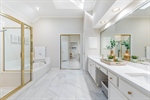 Renovated bathroom has tons of space.