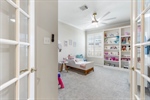 Bedroom or office has double french doors