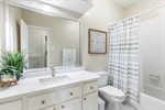 Second full bathroom with quartz counter. 