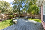 Out back is a nice extended deck with seating.