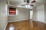 Primary Bedroom 13 x 13 with Hardwood Flooring