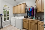 Large laundry room with tons of storage