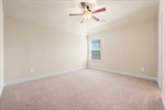 All secondary bedrooms have ceiling fans carpet