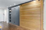 Sliding Wall Hides Storage