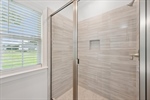 Upgraded tile in the walk in shower.