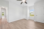 Double closets and lighted fan.