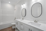 Second full bath with a shower over tub.