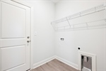Laundry room with garage access.