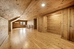 Recessed lighting accentuates the natural wood