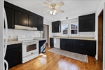 Bright traditional black and white kitchen