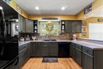 Nicely sized kitchen with lots of cabinets!